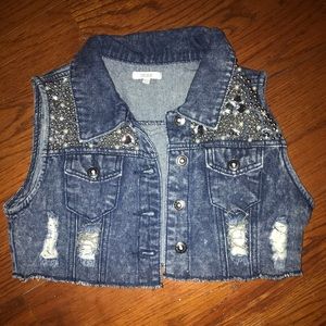 Cropped ripped jean jacket with jewels and chains